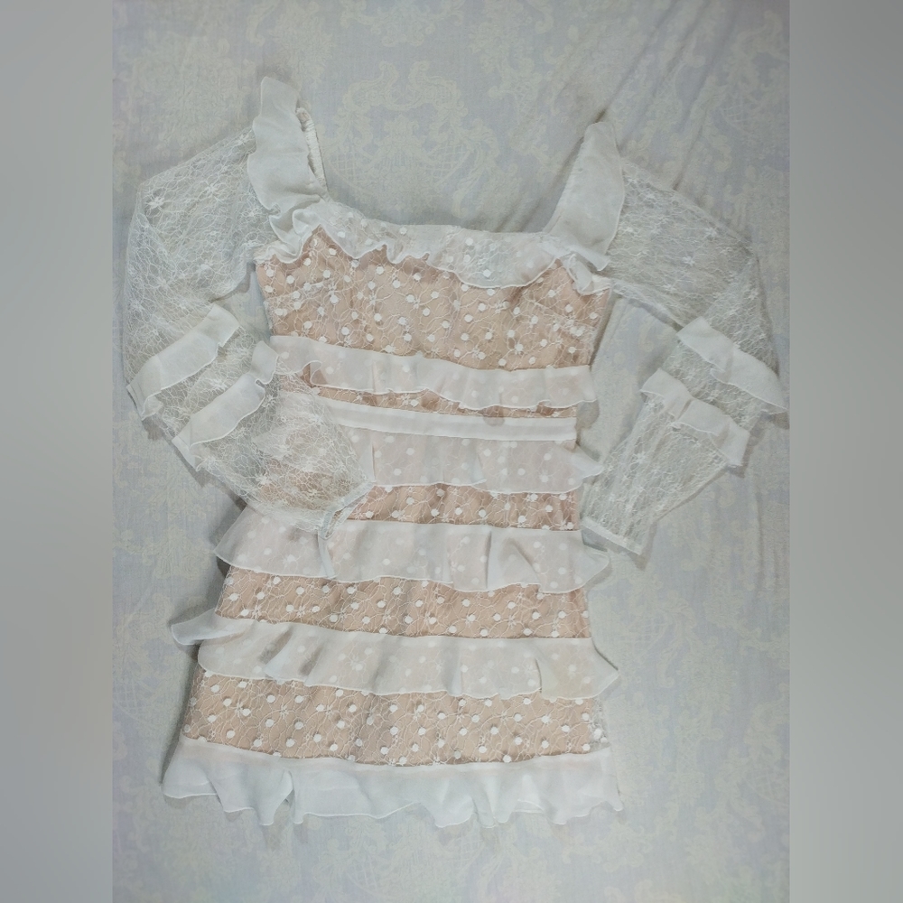 White lacy mini dress with nude lining